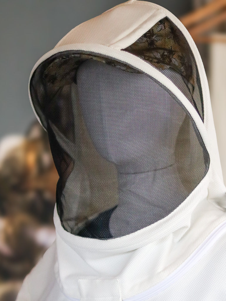 Ivory colored beekeeping jacket with hood.