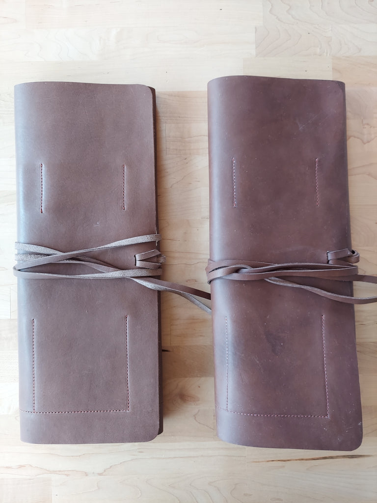 Leather tool roll made to store beekeeping tools.